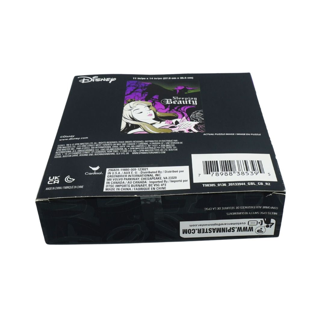 Disney Sleeping Beauty themed packaging box, showing the back side with product details, a barcode, and a small character illustration on a black background.