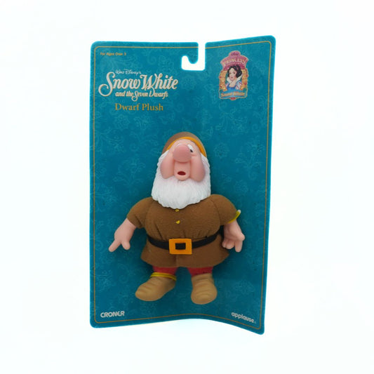 Plush toy of a dwarf from 'Snow White and the Seven Dwarfs' on a blue packaging background.