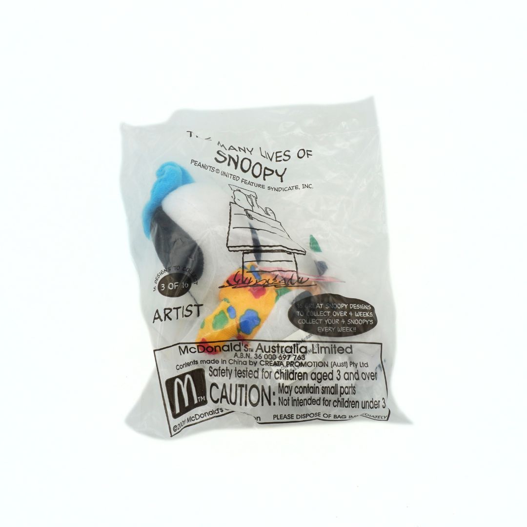 Toy figure in packaging with McDonald's branding on a white background