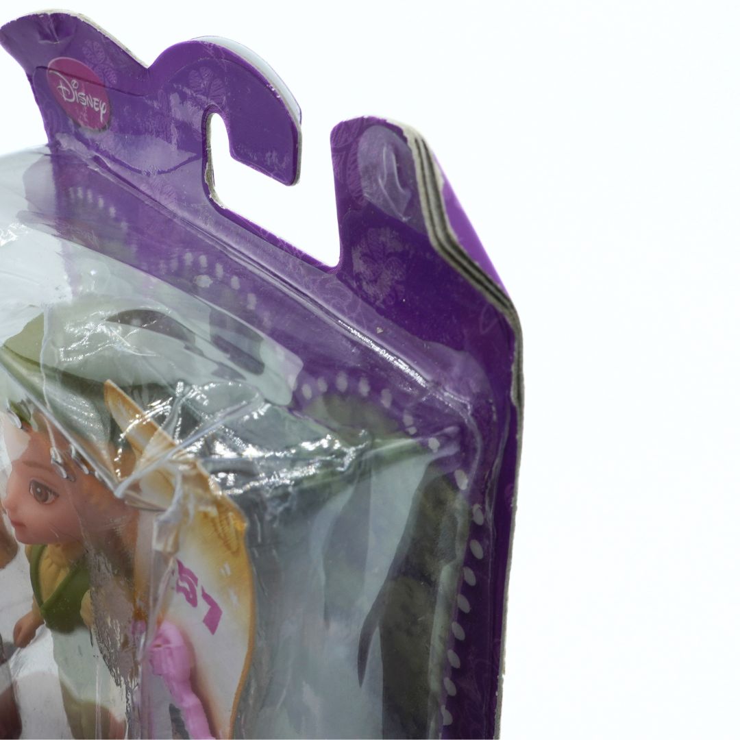 Toy figure in a purple packaging with Disney branding