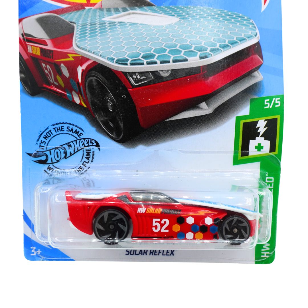 Close up of a red Solar Reflex Hot Wheels toy in packaging, photographed against a white backdrop