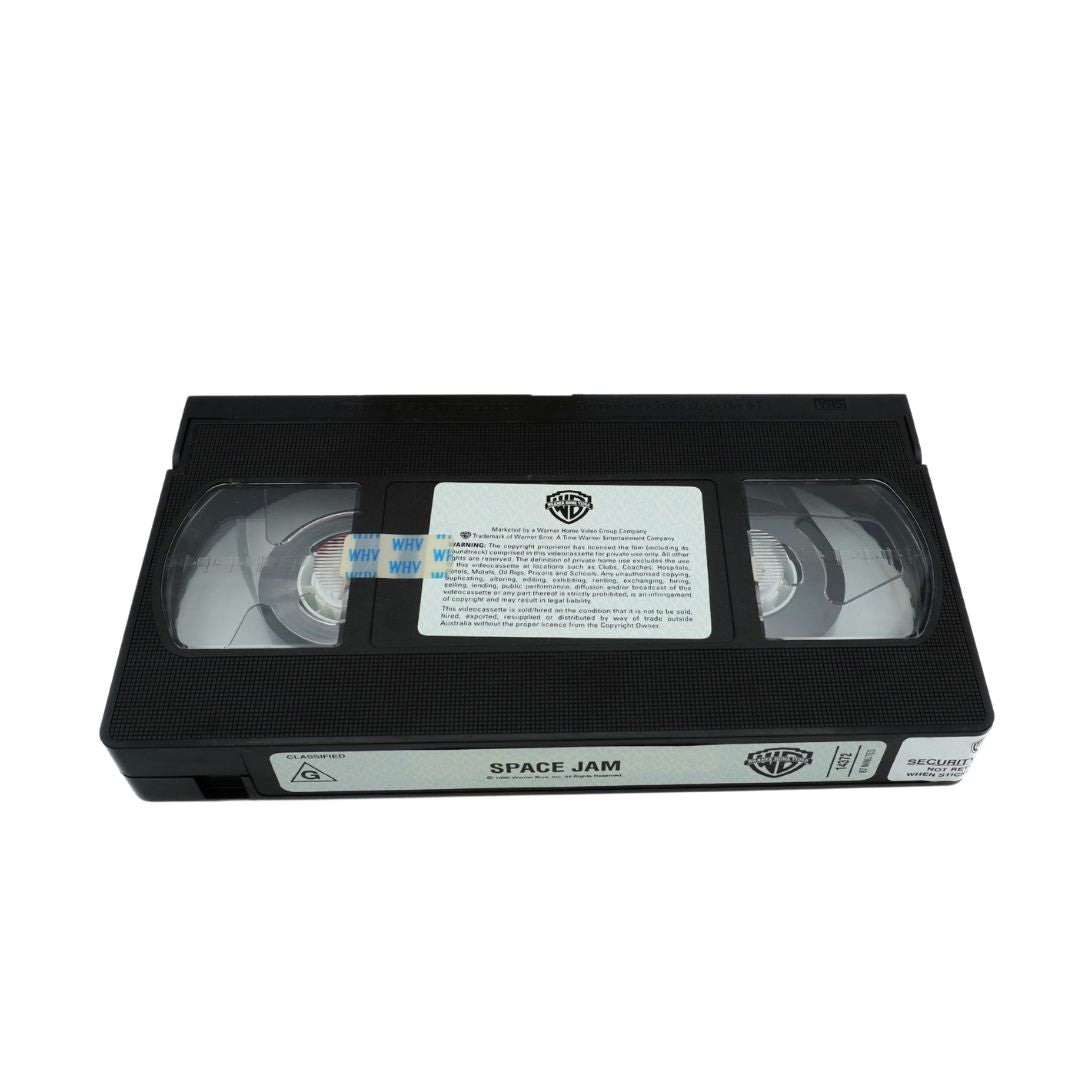 Top down image of the vintage Australian VHS tape of Space Jam showing WB branding