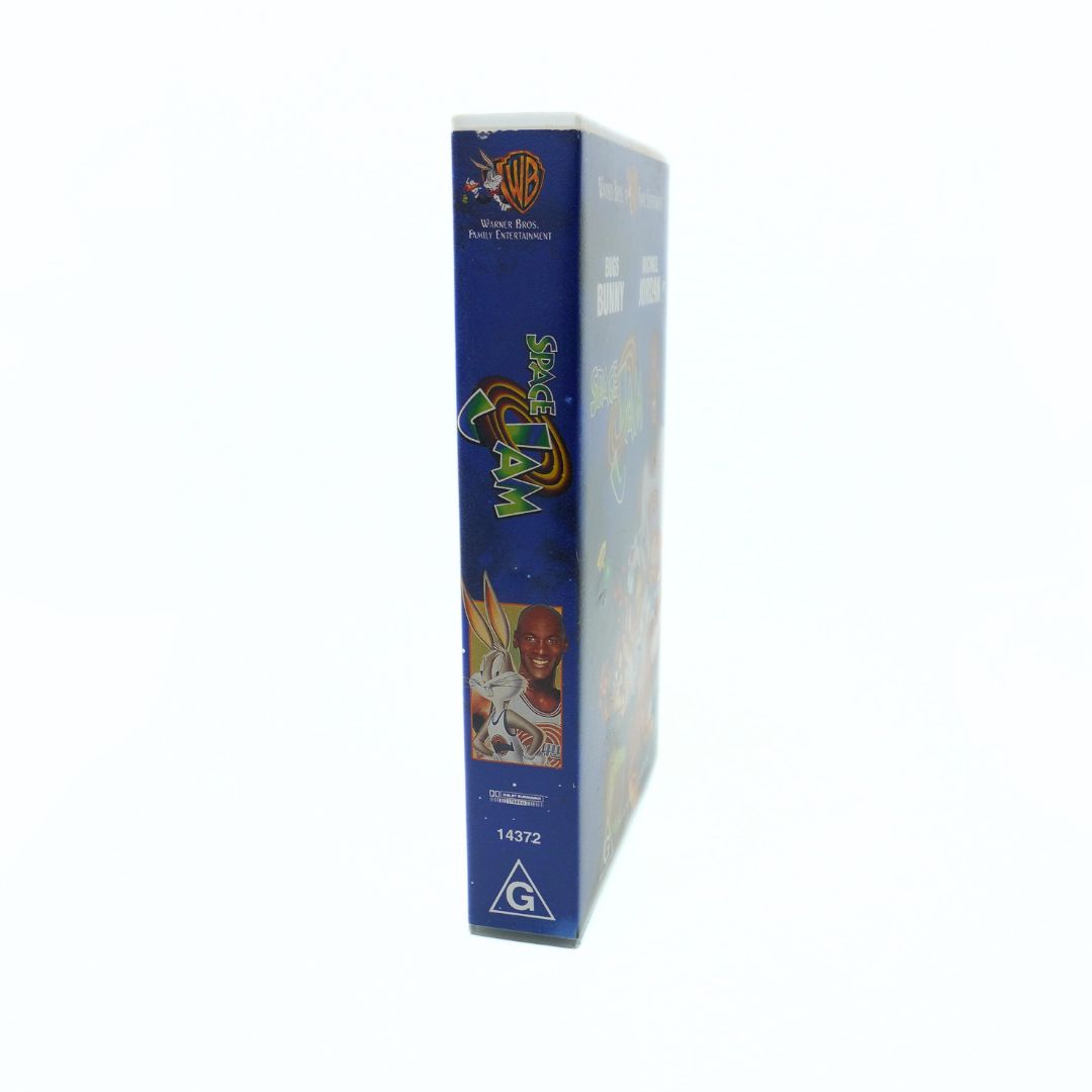 Side on photo of the 90s clamshell Australian case for the Space Jam VHS