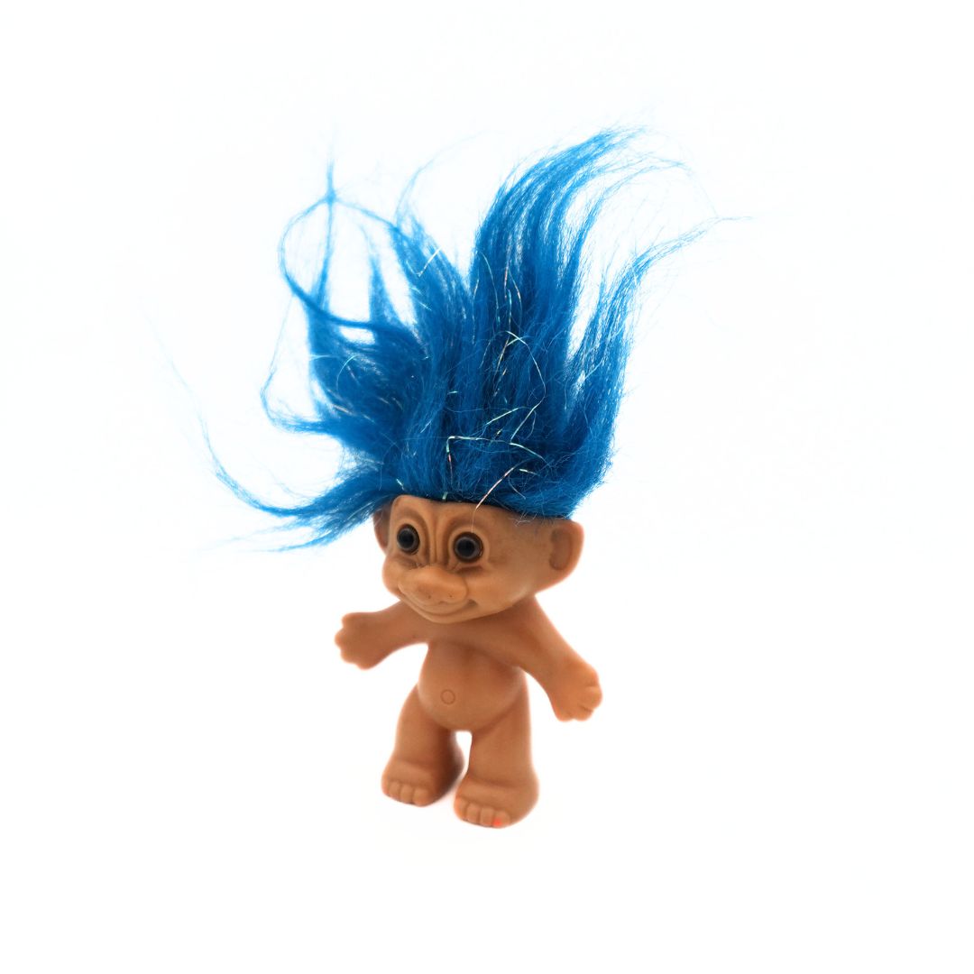 Blue and tinsel hair 90s Troll Doll released by Russ