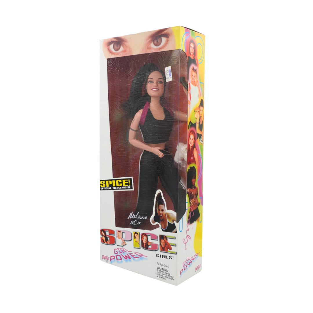 Boxed doll with 'Spice Girl' branding on a white background