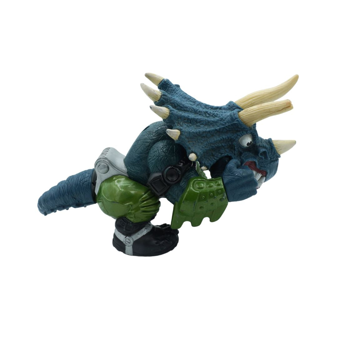 Toy figure of a blue creature with green accents on a white background