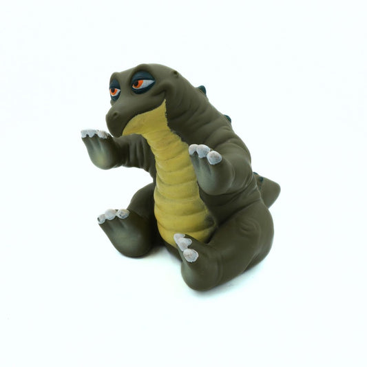 Toy dinosaur figure on a white background