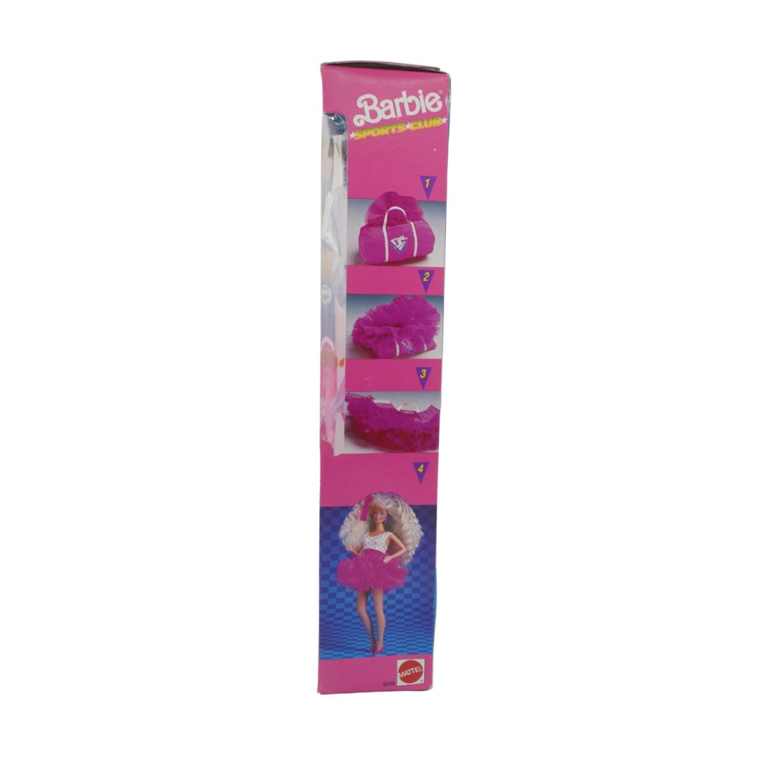 Barbie packaging with pink and purple design on a white background