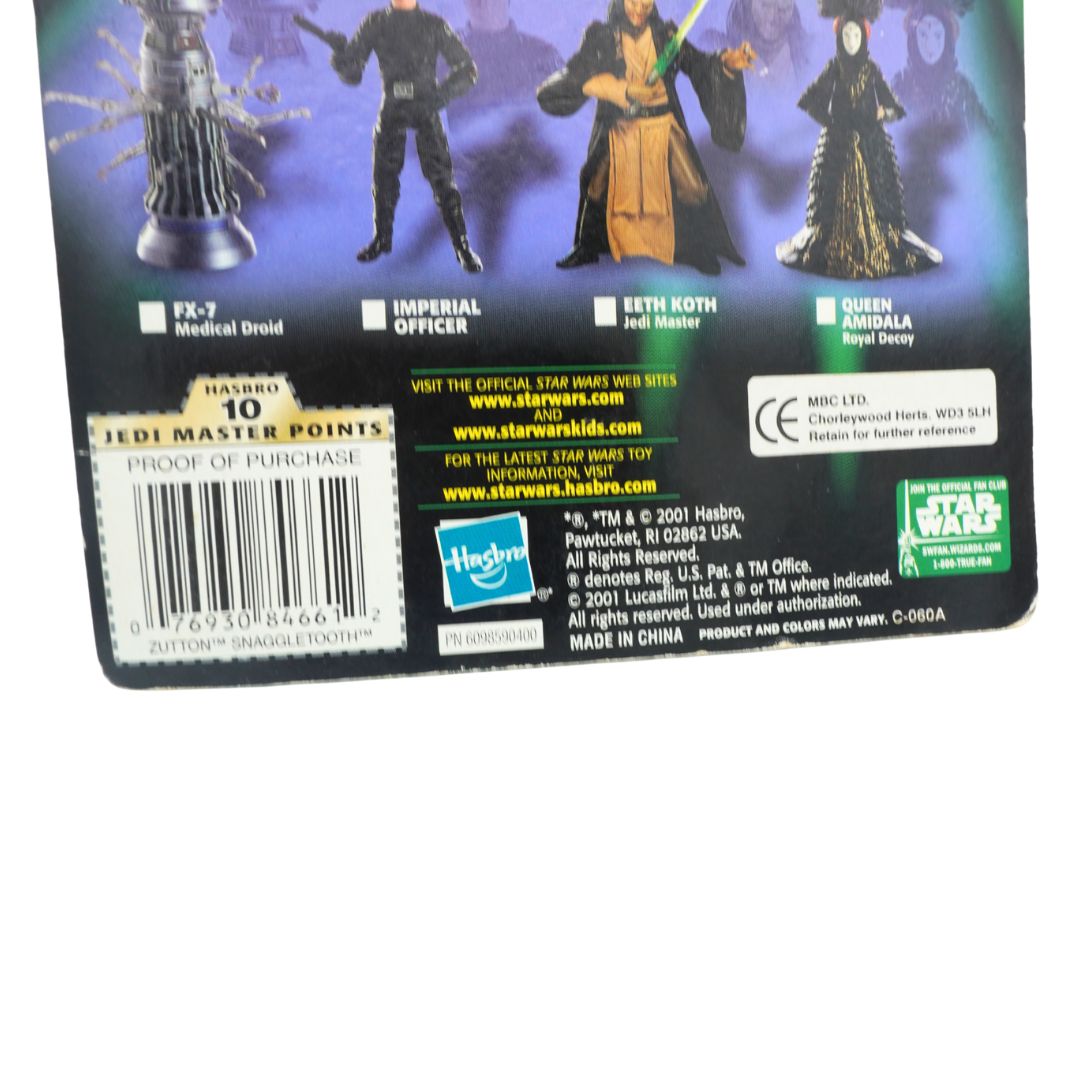 Back of a Star Wars action figure packaging with characters and branding.