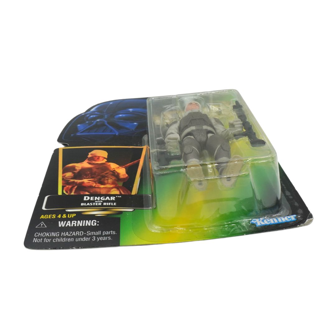 Toy figure in packaging with character cards on a white background