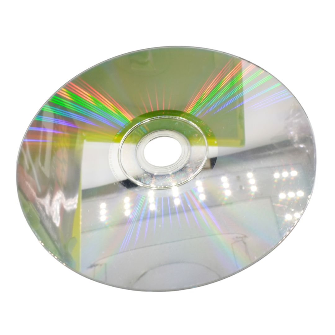 CD or DVD with rainbow reflection on a white background