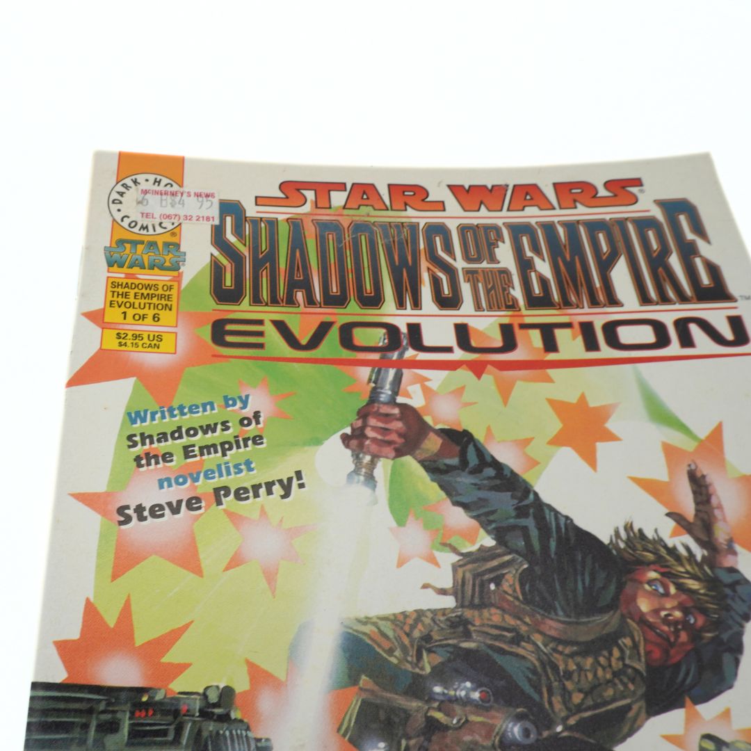 Book cover of 'Star Wars: Shadows of the Empire Evolution' with a character holding a weapon.