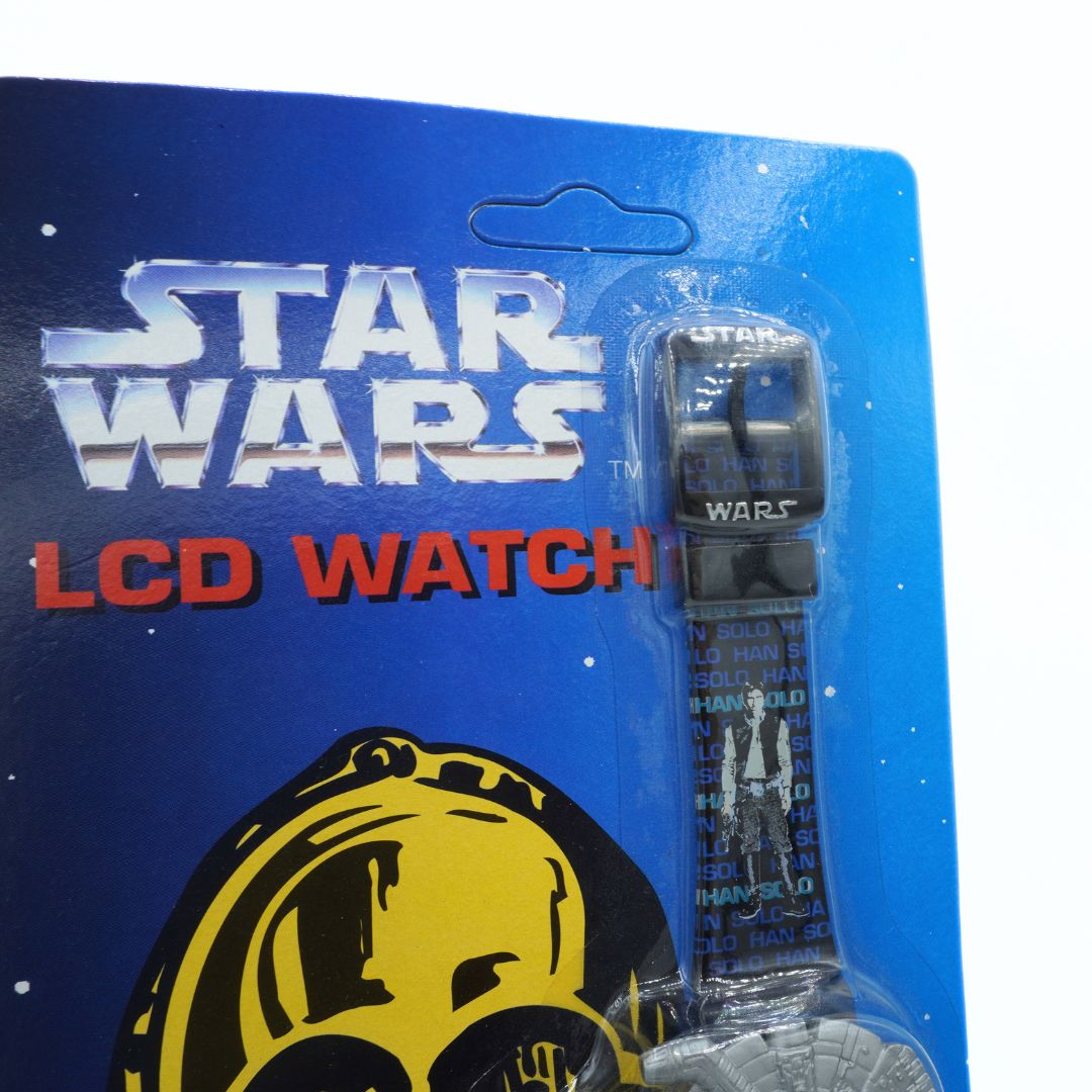 Star Wars LCD watch in packaging with blue background and logo.