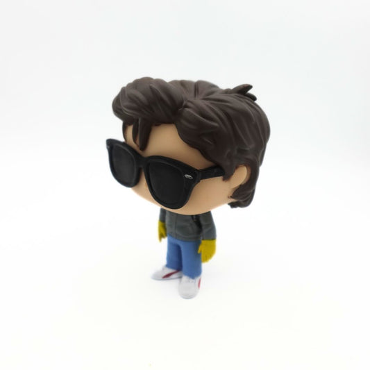 The number 638 Steve Harrington Funko Pop wearing sunglasses and yellow gloves