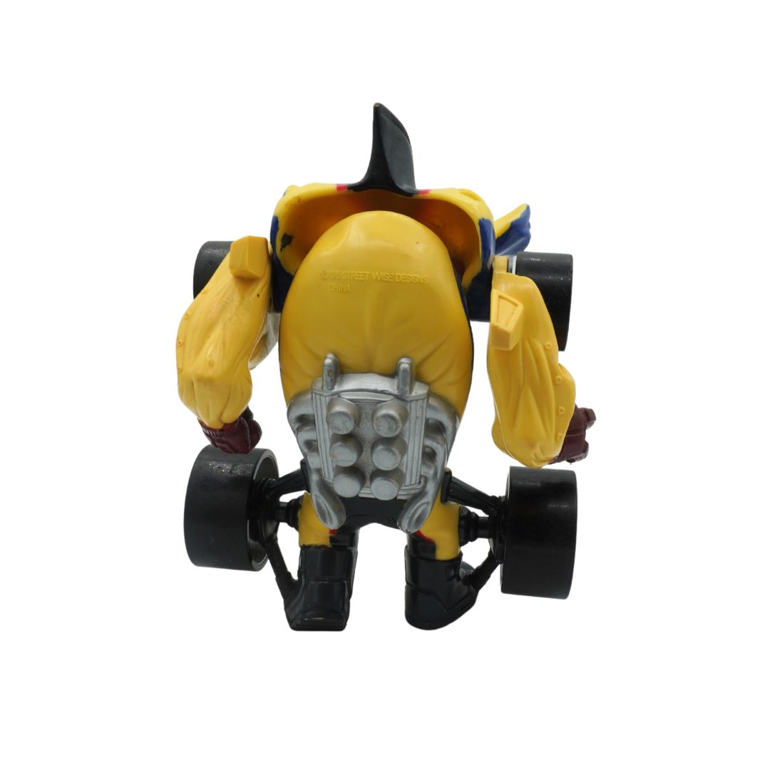 Toy figure of a robot in yellow and black on a white background