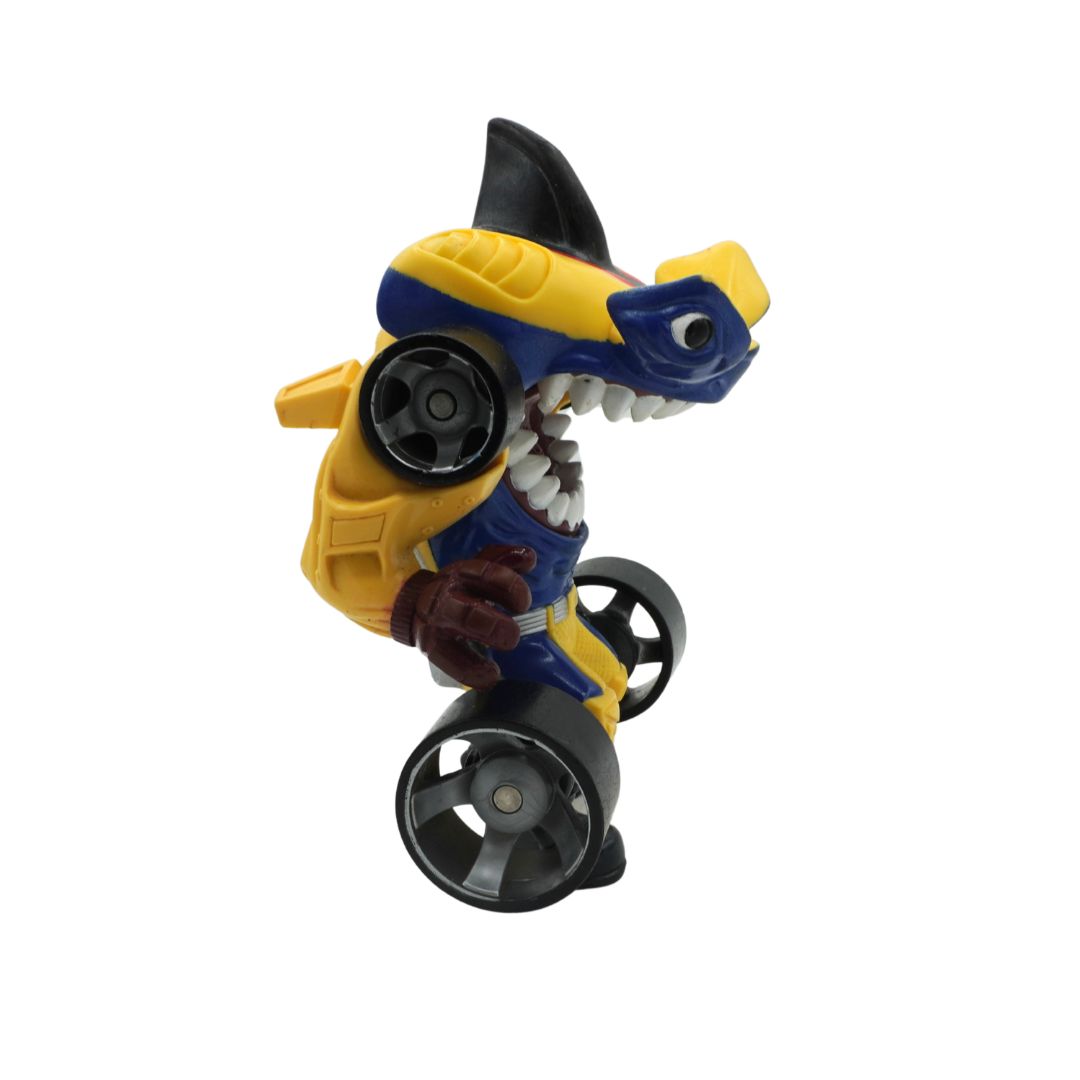 Toy figure of a shark with wheels on a white background