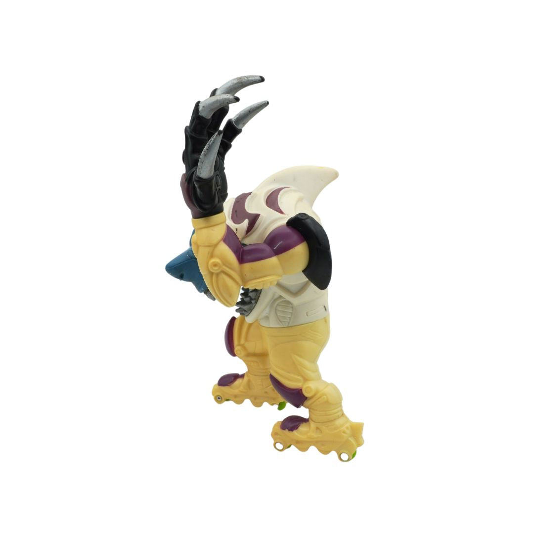 Toy figure of a creature with yellow body, purple accents, and large claws on a white background