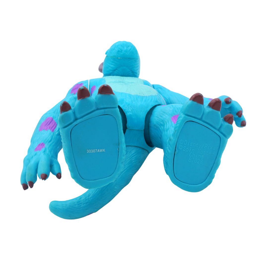 Blue toy resembling a creature with purple accents on a white background