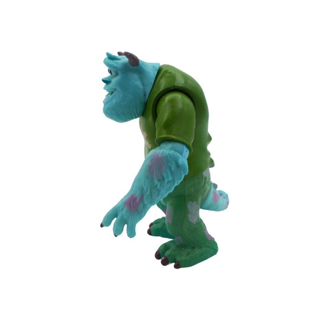 Toy figure with green and blue color scheme on a white background