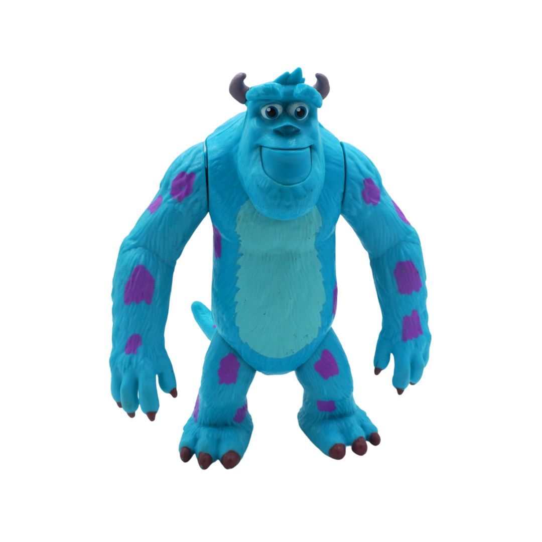 Blue monster toy with purple spots on a white background