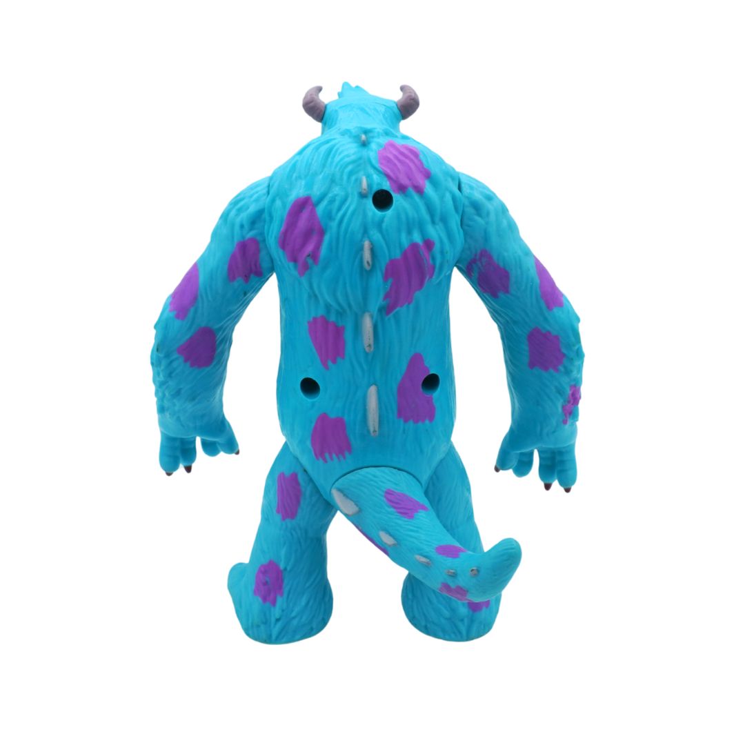 Blue plush toy with purple spots on a white background