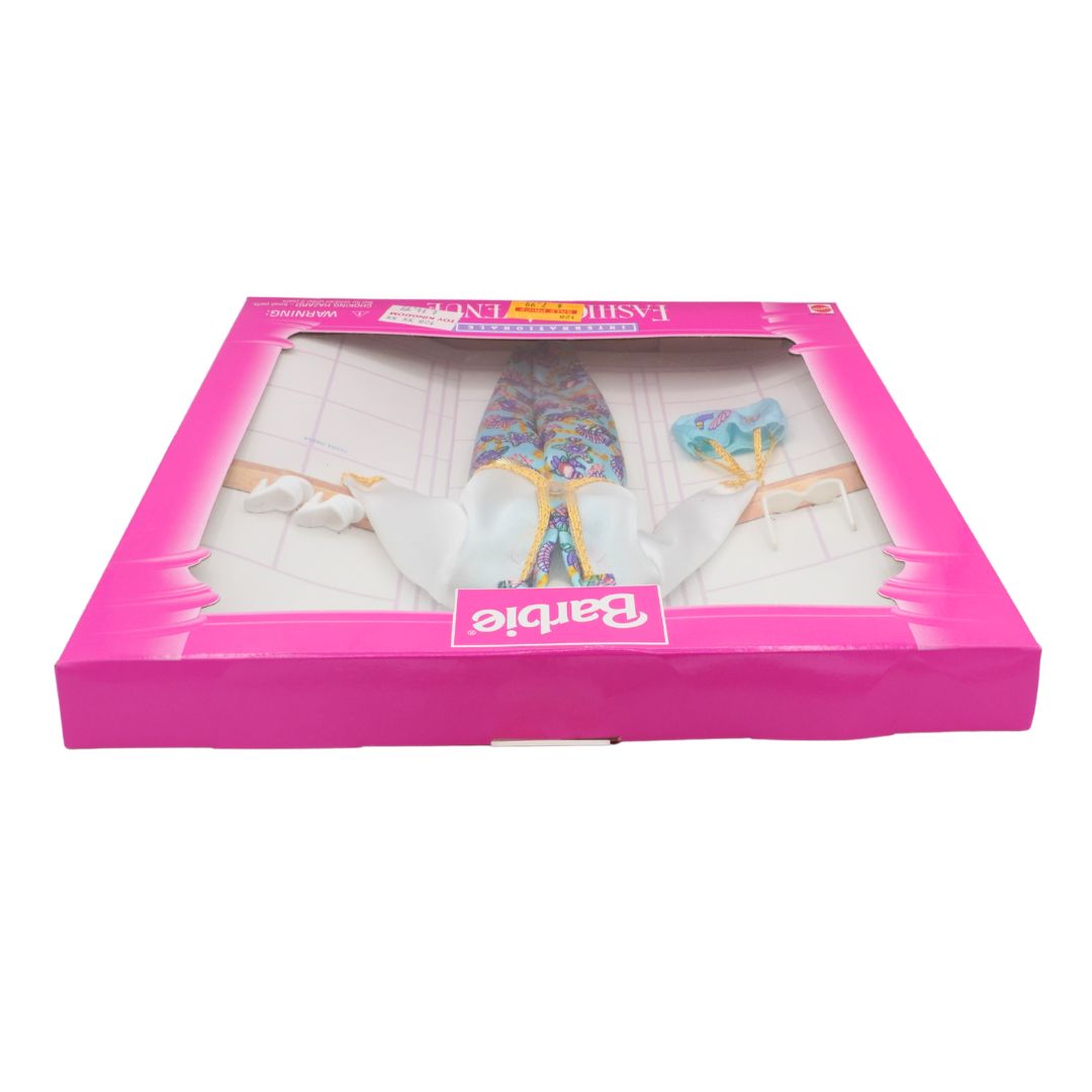 Barbie dress-up toy set in pink packaging with a clear window
