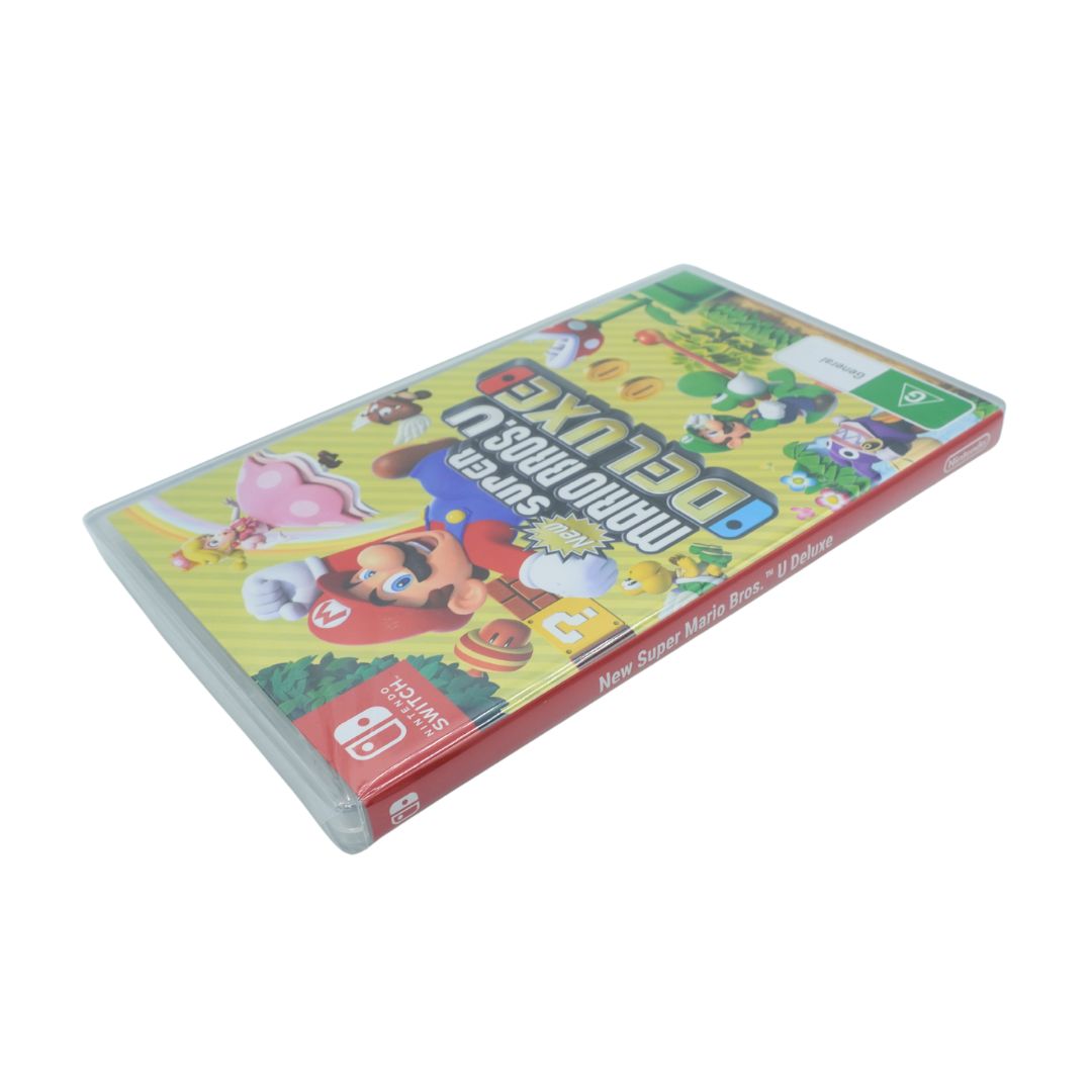 Nintendo Switch game case for Super Mario Deluxe, featuring colorful character artwork on the cover and a red spine, photographed on a plain white background.