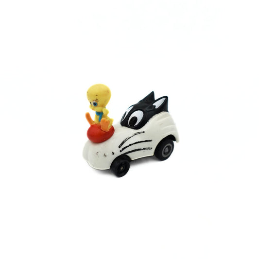 1990 Happy Meal toy featuring a Sylvester the Cat toy car with Tweety Bird sitting on top