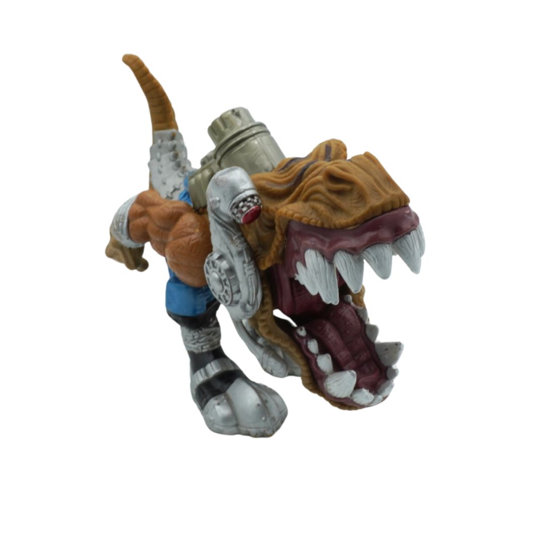 Toy figure of a character with a large creature on its back against a white background