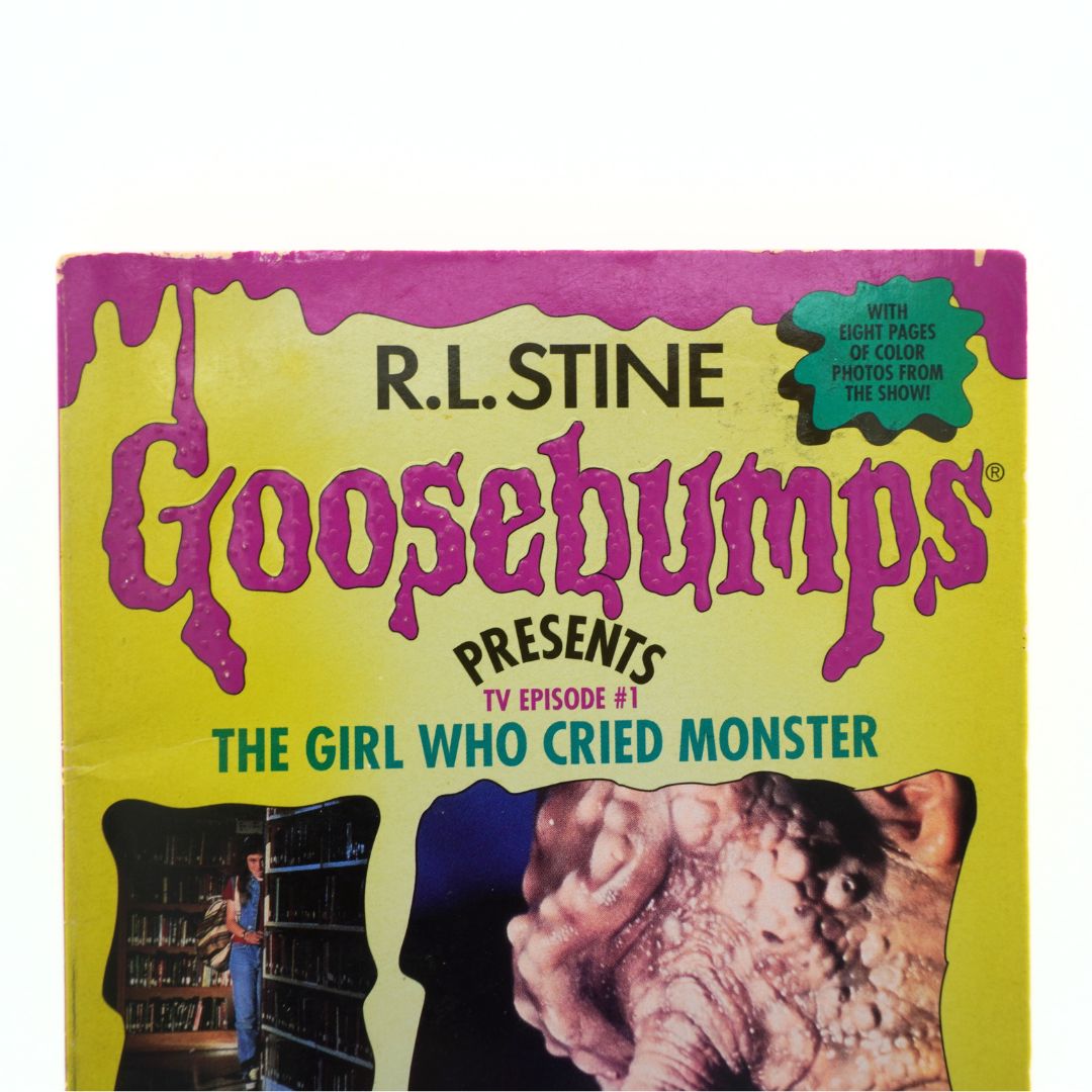 Vintage 'Goosebumps' book cover with R.L. Stine's name and a monster illustration.