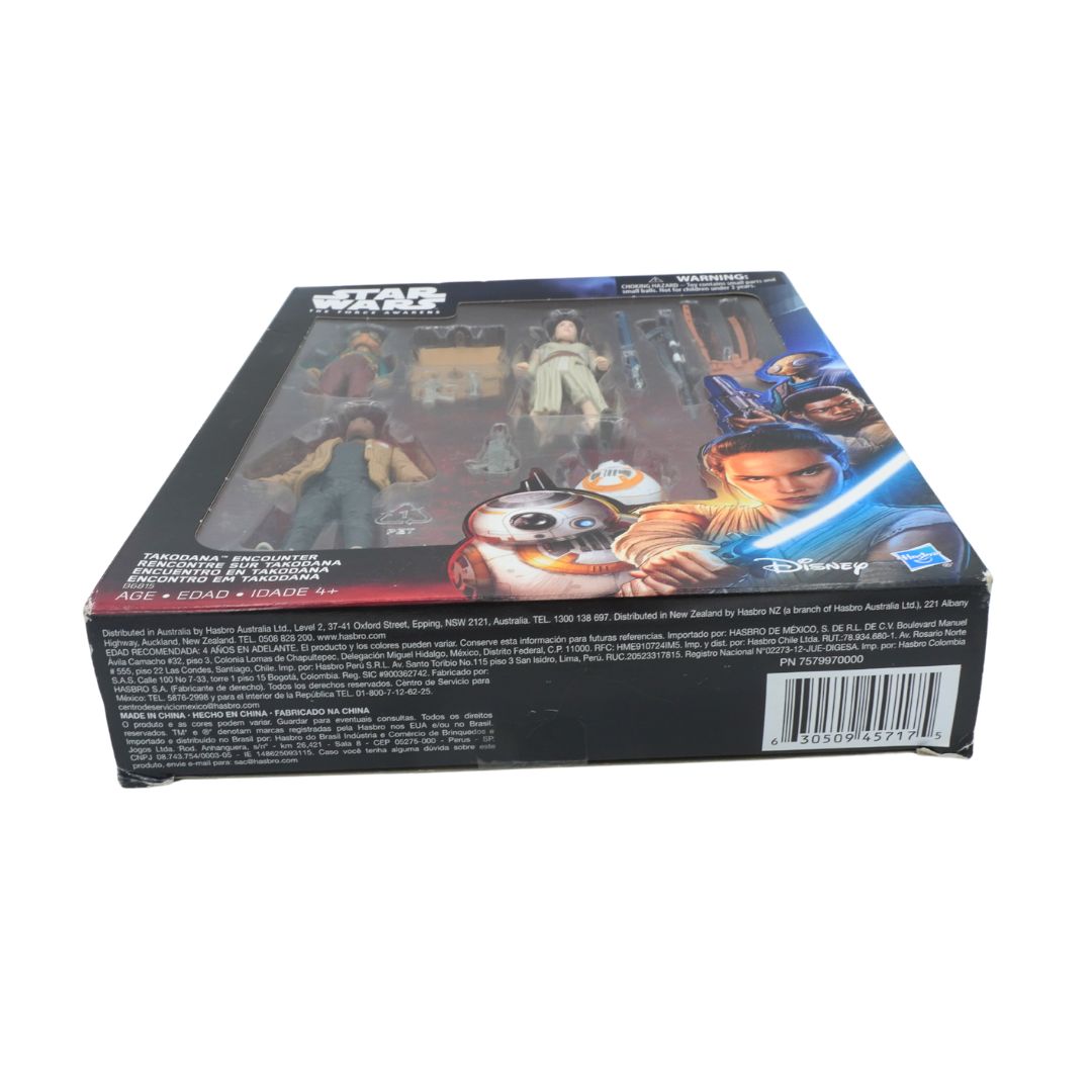 Toy figure packaging with characters and branding on a white background