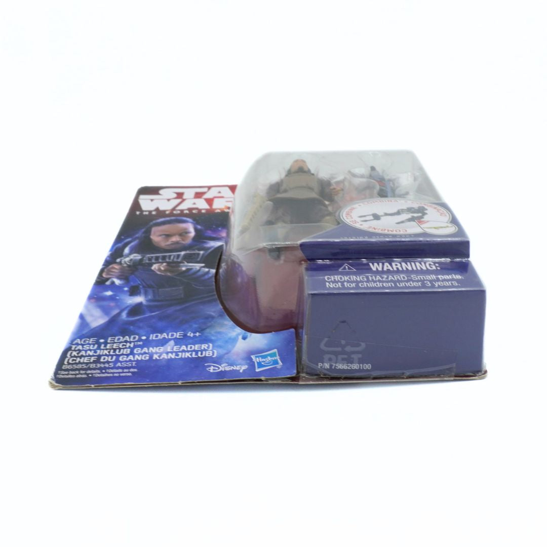 Star Wars action figure in packaging with warning label
