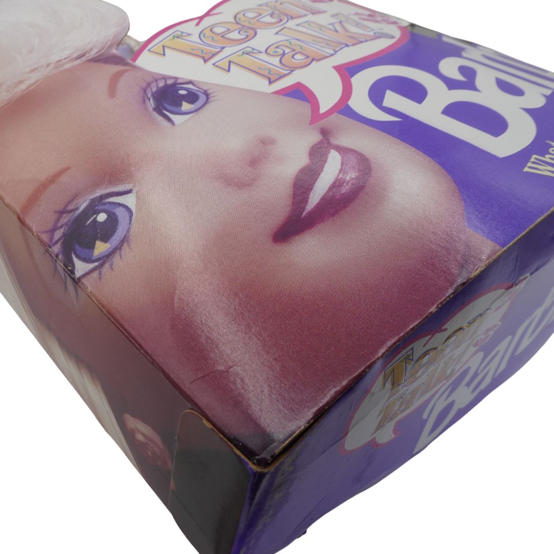 Close-up of a doll packaging with a child's face on it