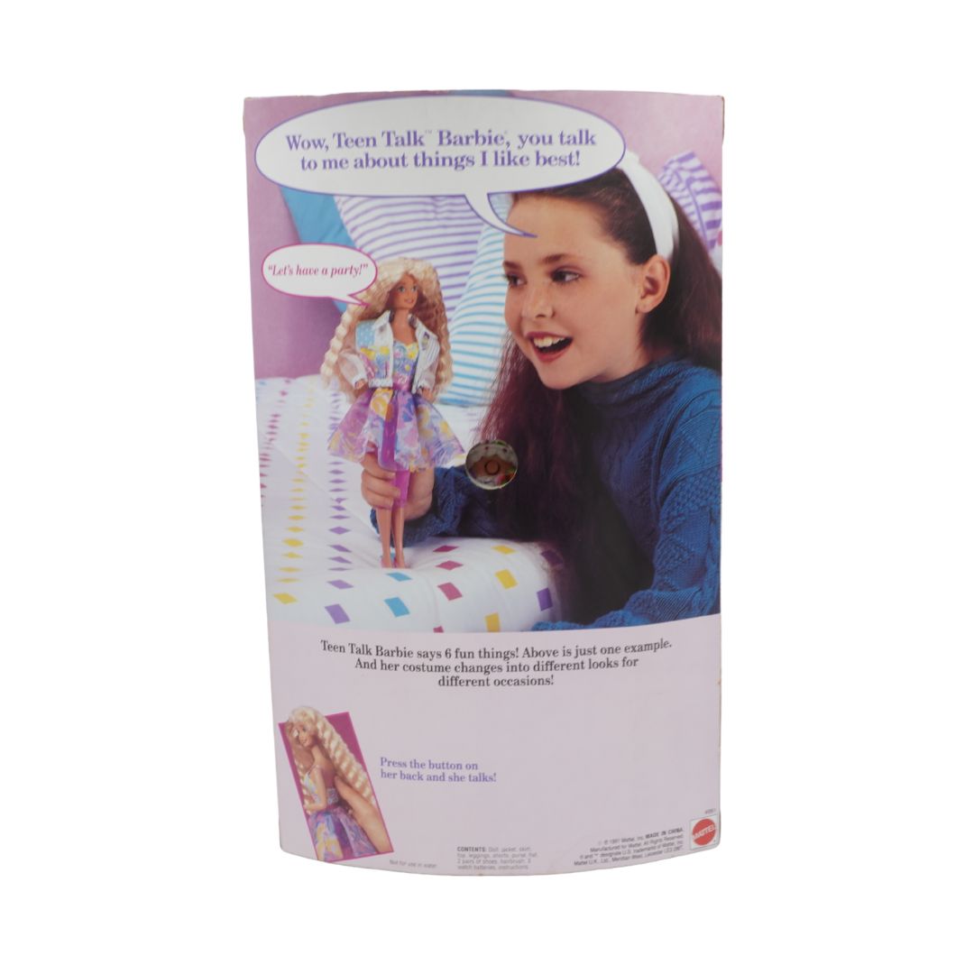 Barbie Teen Talk doll packaging with a girl holding the doll and text on a white background