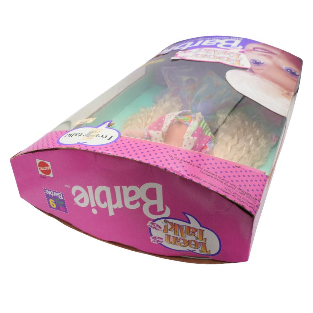 Barbie doll packaging with pink and purple design