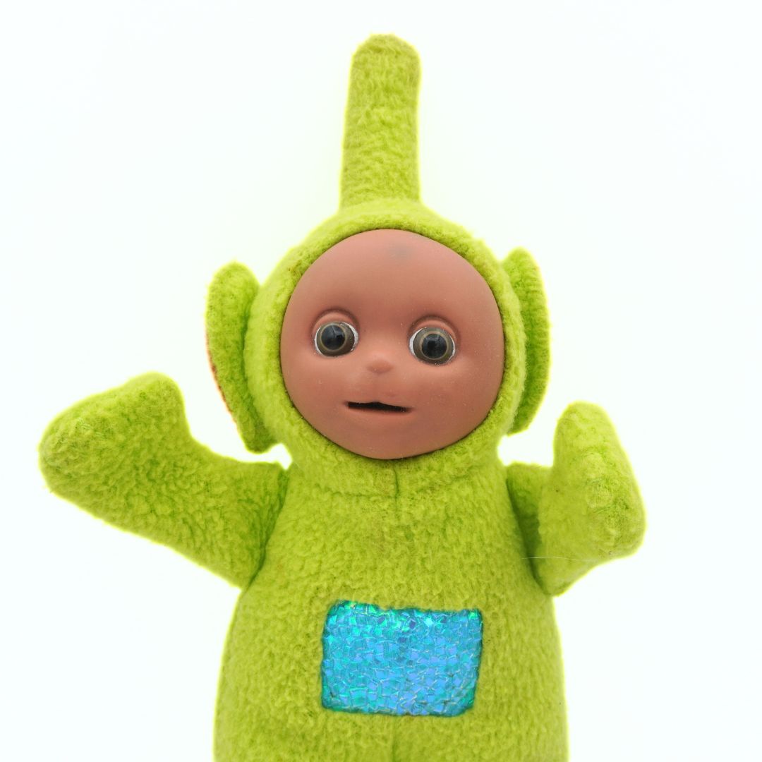 Dipsy Teletubby plush released in the 90s with a green body and blue TV style stomach