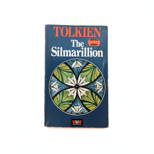 Front cover of a 1979 paperback edition of the Tolkien book The Silmarillion with a blue, green and orange colour palette