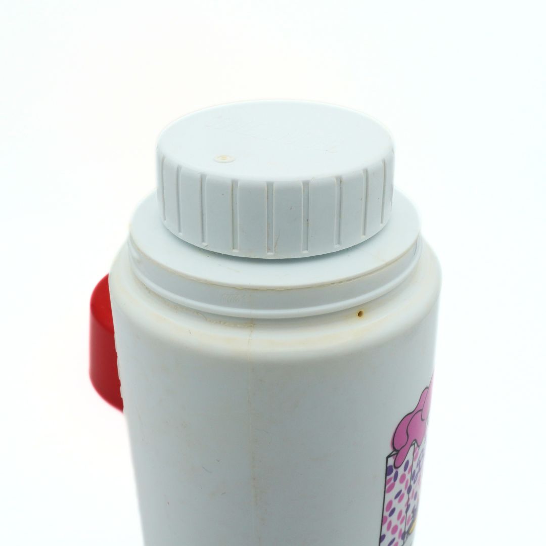 White lid section of a 1990 Mattel Barbie Thermos