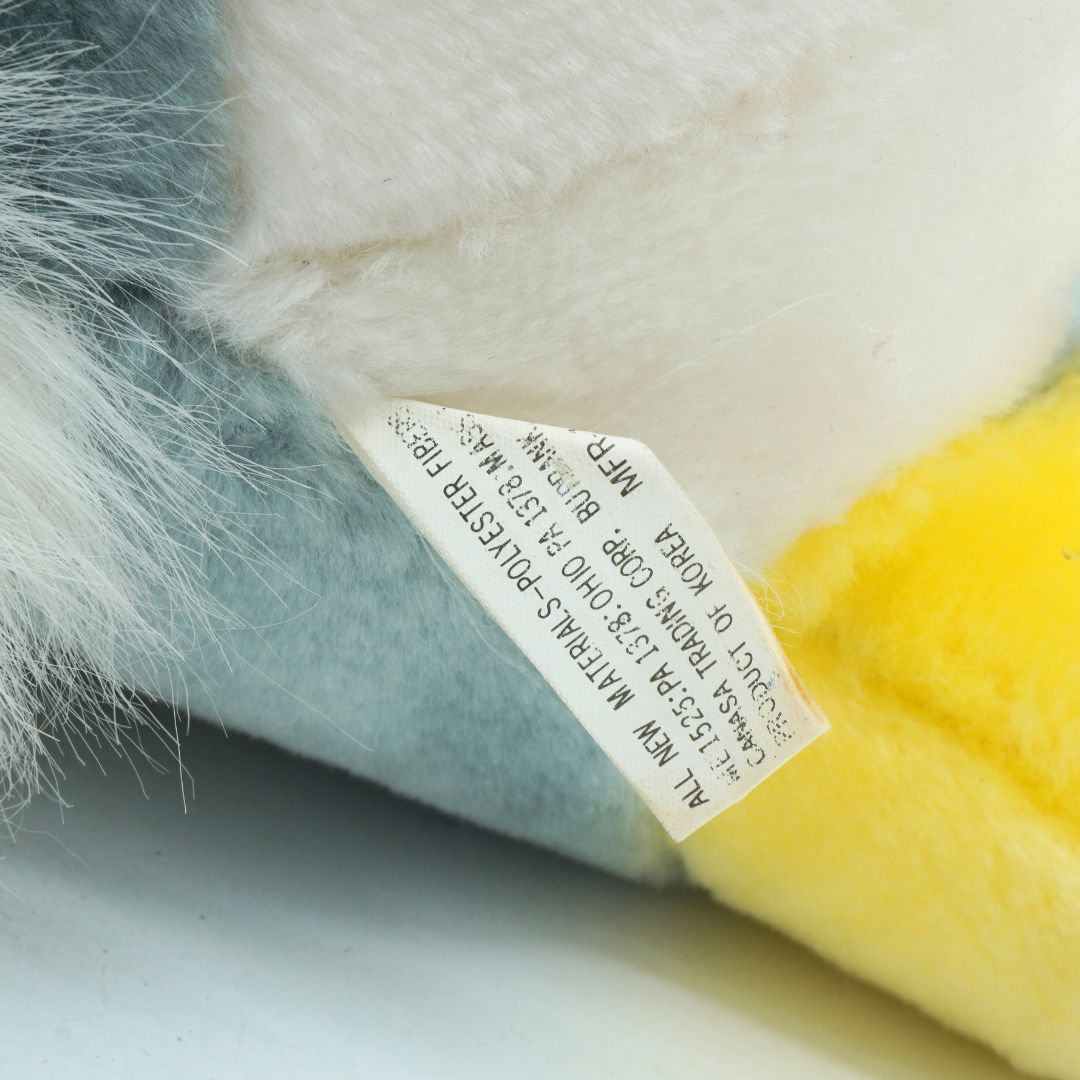 Close up of a tag on a vintage Thumper plush released by Disney