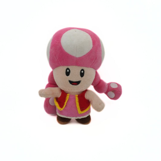 Pink plush toy with a mushroom cap on a white background