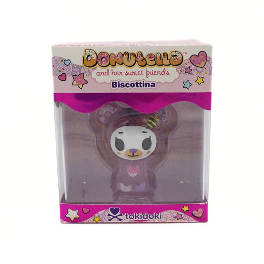 Tokidoki Biscottina figure in its original packaging, featuring a cute bear character inside a clear plastic box with a pink and white branded cardboard header.