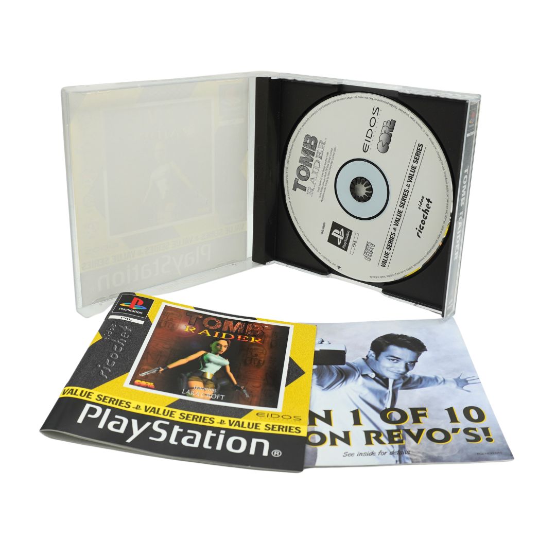 Case for the Playstation game Tomb Raider showing the disc and pamphlets, photographed on a white background