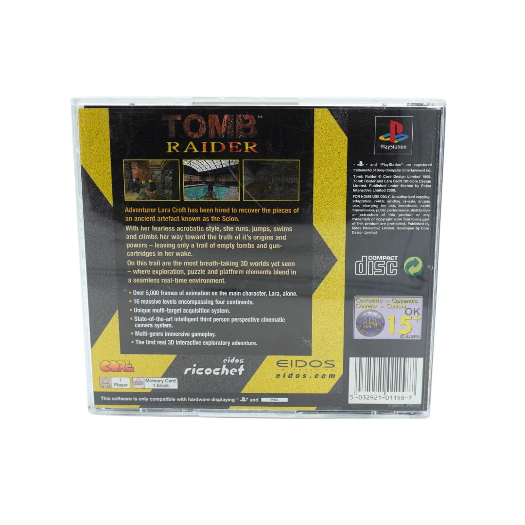 Yellow and black case for the Playstation game Tomb Raider, photographed on a white background