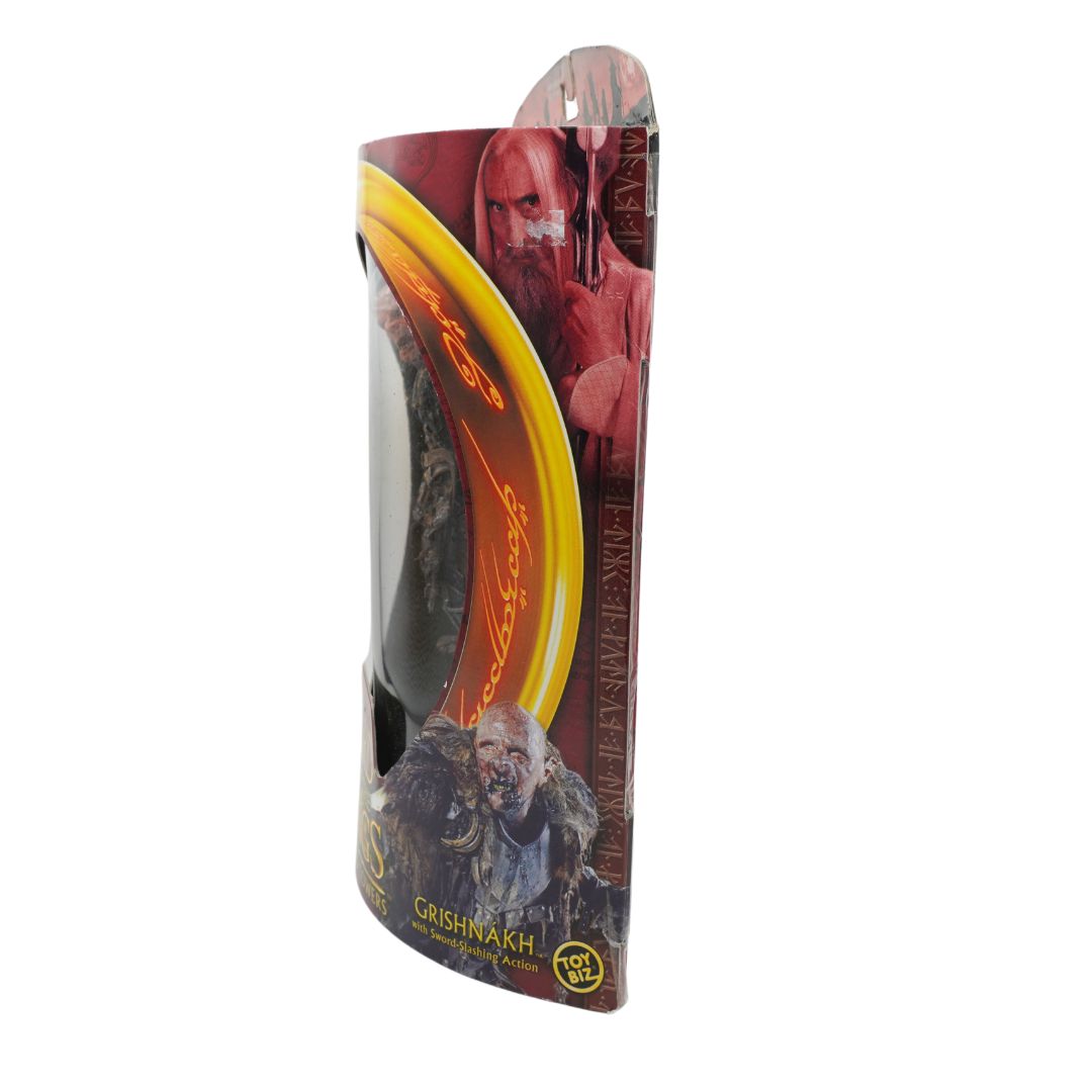 A front on photo of Grishnakh from Lord of the Rings in red and yellow packaging on a white background