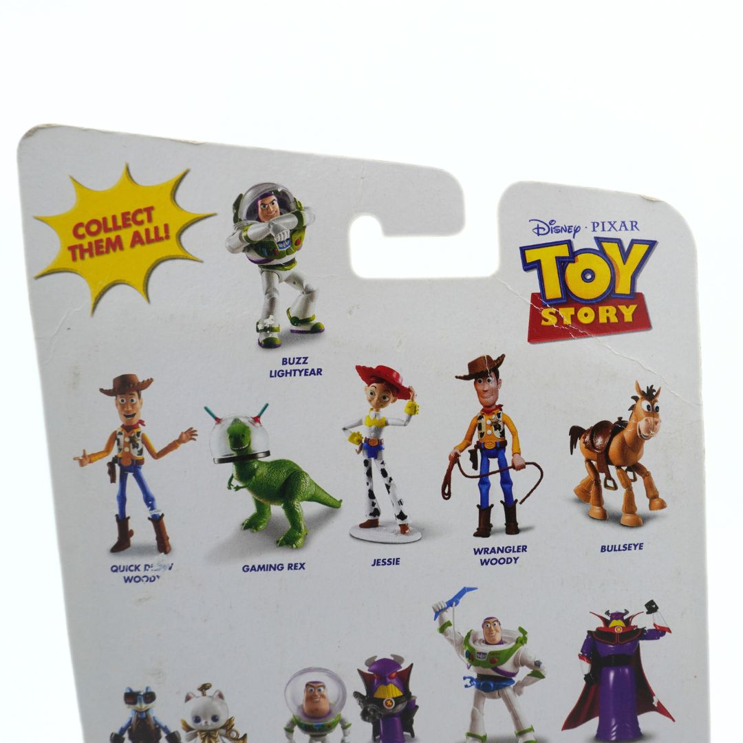Toy Story action figure set on a white background with branding.