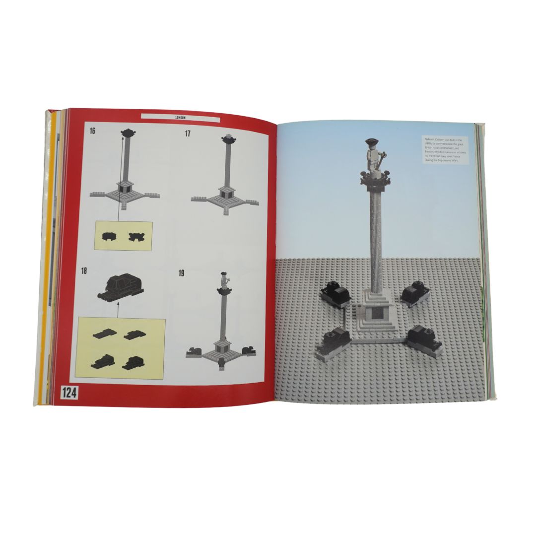 Inside page of a Lego book showing instructions on how to build a replica of Trafalga Square in London on a white backdrop