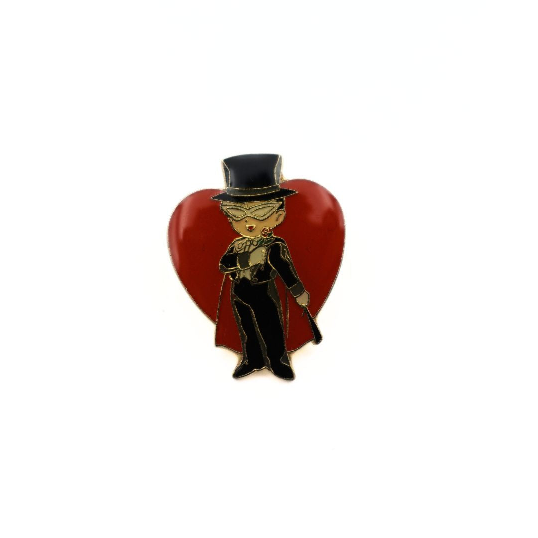 Heart shaped Tuxedo Mask pin released in the 90s as Sailor Moon merch