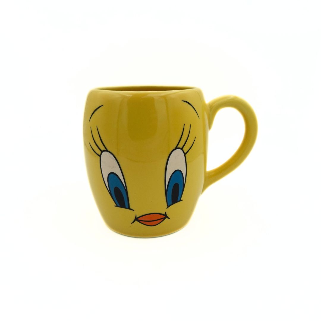 Front on photo of the yellow Tweety Bird Movie World mug