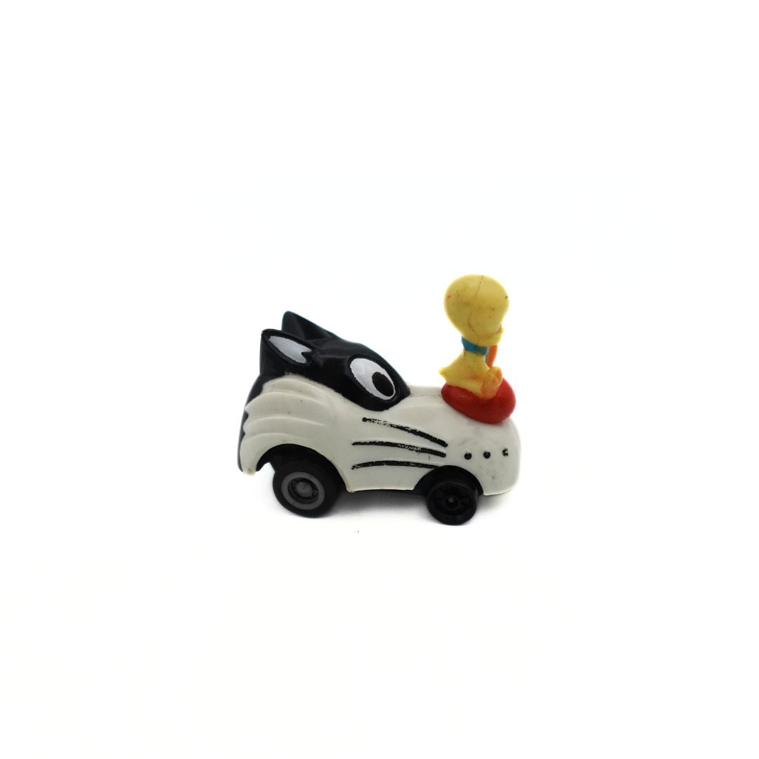 1990 Happy Meal toy featuring a Sylvester the Cat toy car with Tweety Bird sitting on top