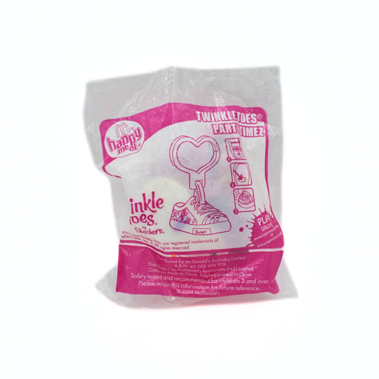 Package of 'twinkle toes' with pink and white design on a white background